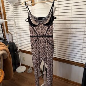 PLAYBOY Black and Pink Patterned Bodysuit. New with tags!